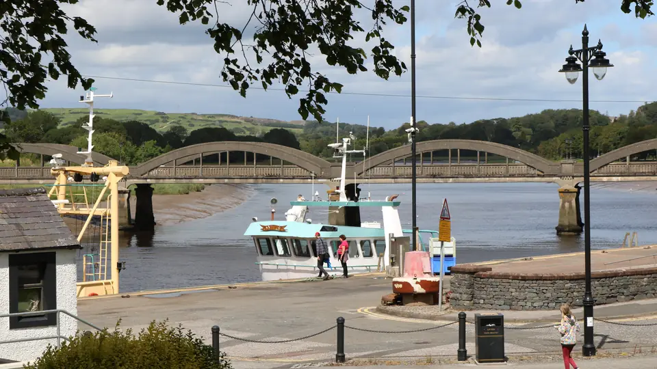 Kirkcudbright harbour on the River Dee, with the road bridge behind