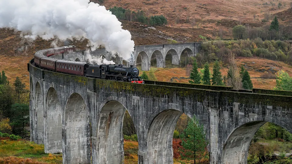 The Jacobite steam train crossing Glenfinnan Viaduct